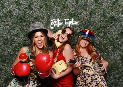 KudoBooth photobooth pictures from a wedding — guests with props
