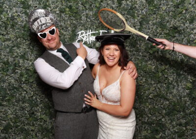 KudoBooth photobooth pictures from a wedding — guests with props