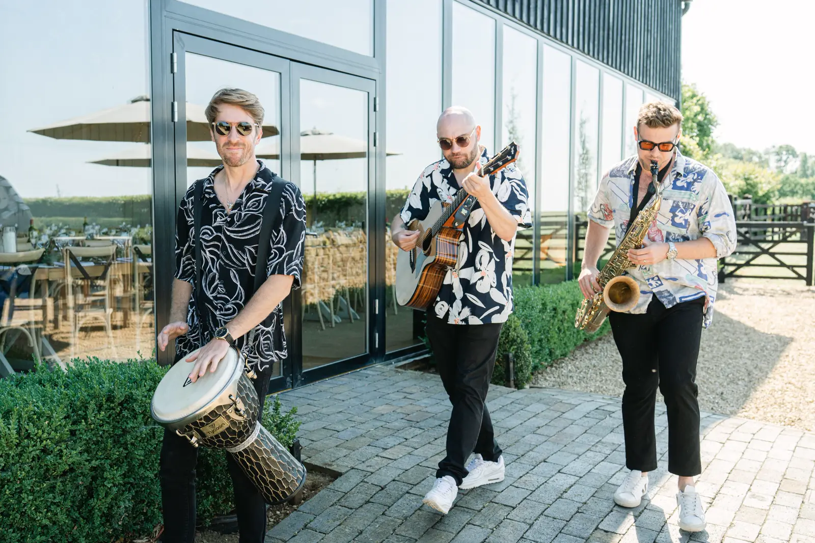 Club Kudo roaming trio with percussion, guitar and sax at Primrose Hill Farm, Oxfordshire