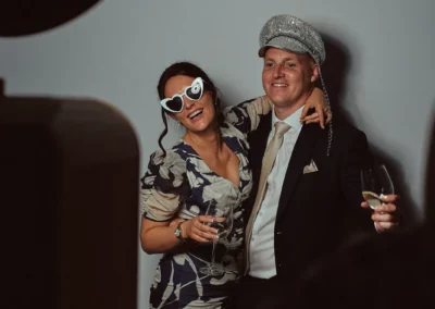 Couple in sunglasses at the Club Kudo photo booth